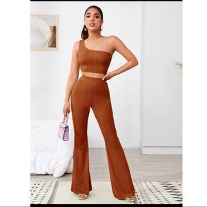 One shoulder ribbed crop top and pants.